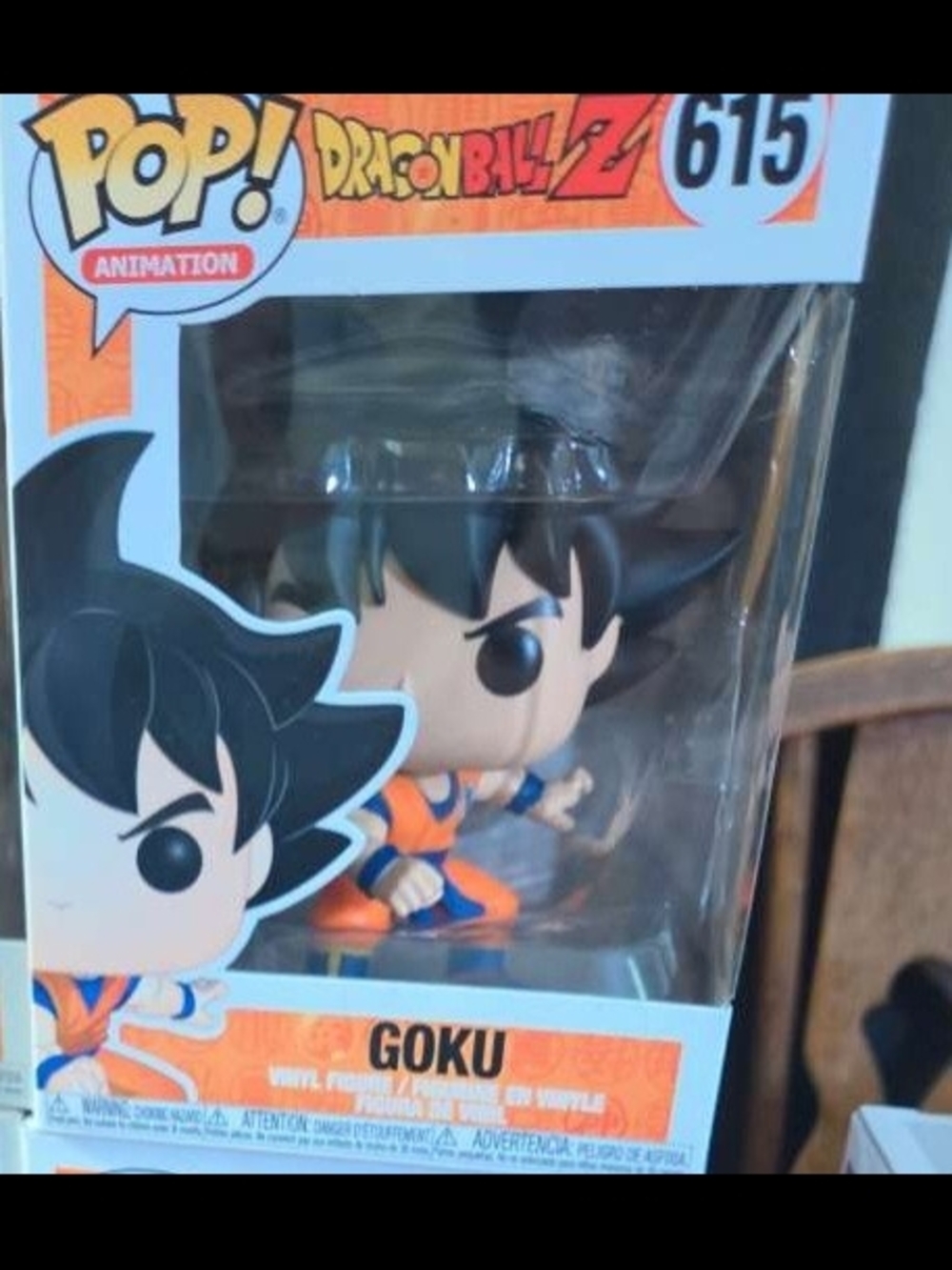 Funko Pop! Goku Figure - Orange, Blue & Black